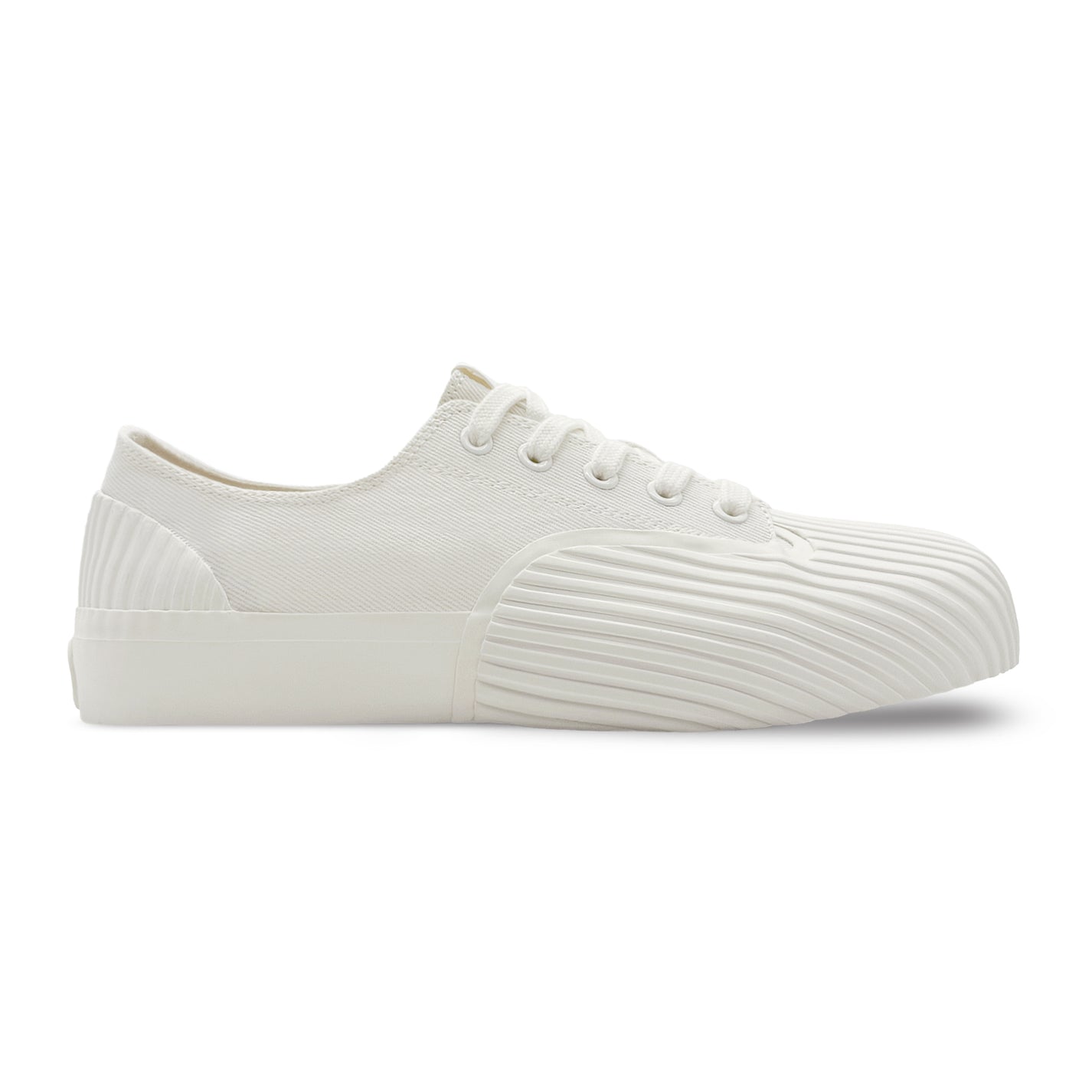 White canvas vulcanised low-top sneakers by UNFORMED.