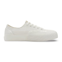 White canvas vulcanised low-top sneakers by UNFORMED.
