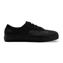 Black canvas vulcanised low-top sneakers by UNFORMED