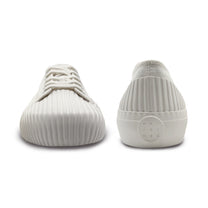 Front and back view of UNFORMED white canvas low-top sneakers