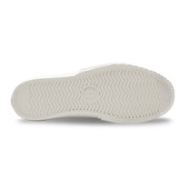 Vulcanised rubber sole detail on UNFORMED white canvas sneakers