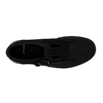 Top view of UNFORMED black canvas low-top sneakers